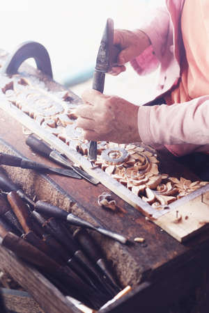 Carpenter uses carved chisels,Carved wood,Use the tool,Folk crafts,Use a hammerの写真素材