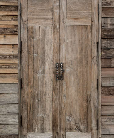 Old wooden doors that are closedの写真素材