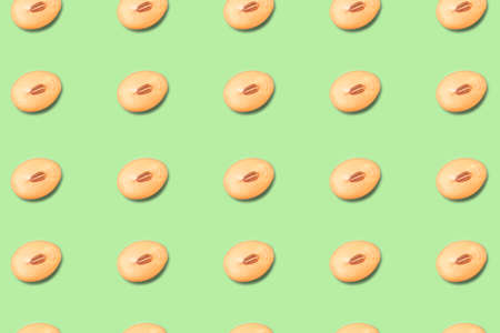 Dry soy bean close up and green background