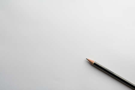 Wooden pencil black color on white backgroundの写真素材
