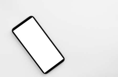 Smartphone with isolated screen on white background and copy spaceの写真素材