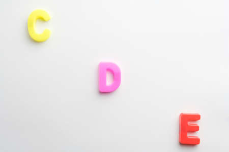 Letter to learn spelling,Colorful letter help children to learn on white background and copy spaceの写真素材