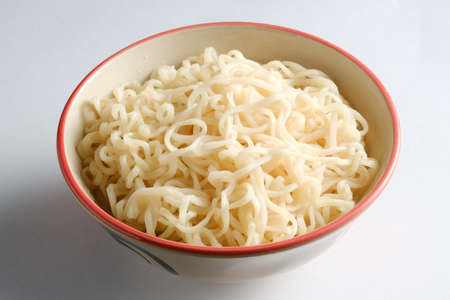 Noodle in bowl with white backgroundの写真素材