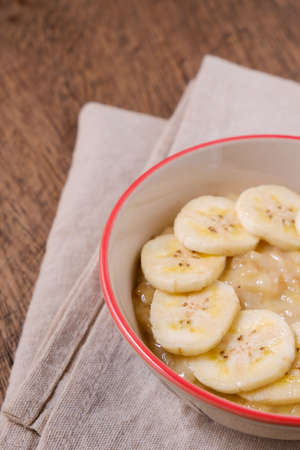 close up mashed bananas in bowlの写真素材
