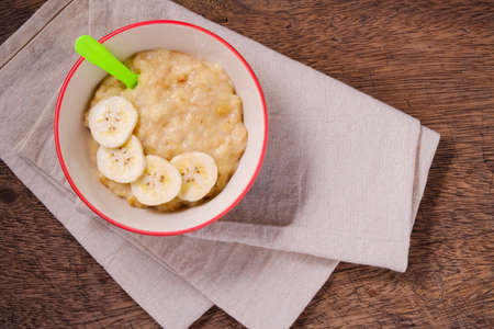 mashed bananas in bowl and copy space. top view foodの写真素材