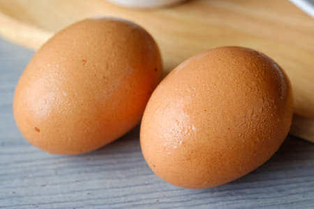 Close up eggs on boardの写真素材