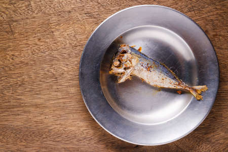 Fried mackerel on dish with copy spaceの写真素材