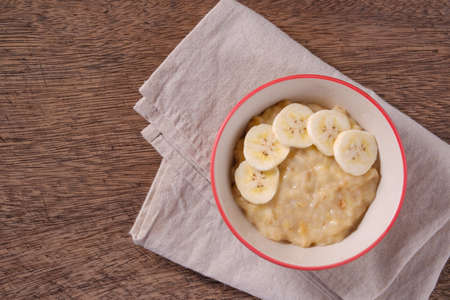 mashed bananas in bowl and copy space .topview foodの写真素材