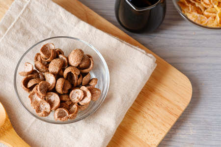 Cereals breakfast cocoa flavor in bowl on napery.top view food concept and copy spaceの写真素材