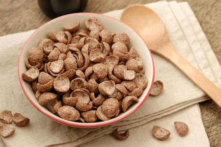Cereals breakfast cocoa flavor in bowl on naperyの写真素材