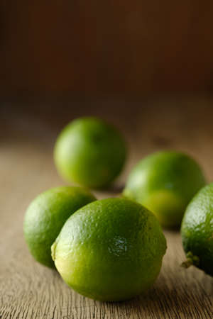 Lime on wooden boardの写真素材