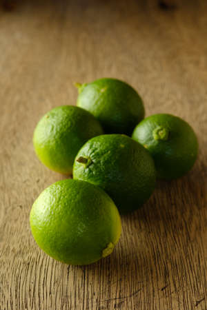 Lime on wooden boardの写真素材