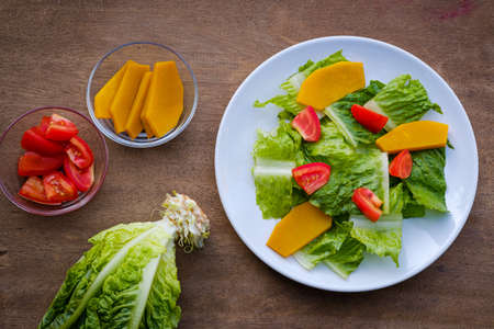 Mix salad vegetable  in white dish,veganの写真素材