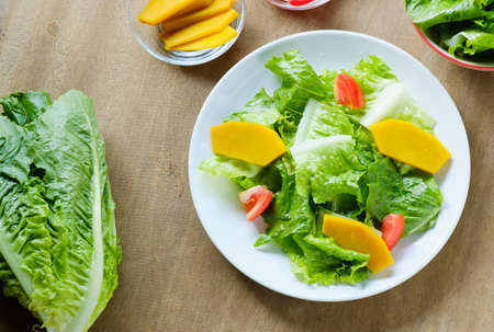Mix salad vegetable  in white dish,veganの写真素材