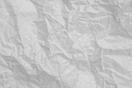 Gray crumpled paper empty background.texture of gray creased paperの写真素材