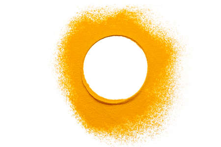 Dry turmeric powder isolated on white background.Close-up of powder orange color turmeric.top view.Circle curryの写真素材