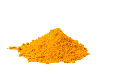 Dry turmeric powder isolated on white background.Close-up of powder orange color turmeric.top viewの写真素材