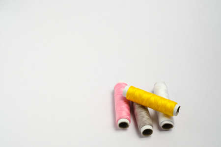 Close up of thread on white background with copy spaceの写真素材