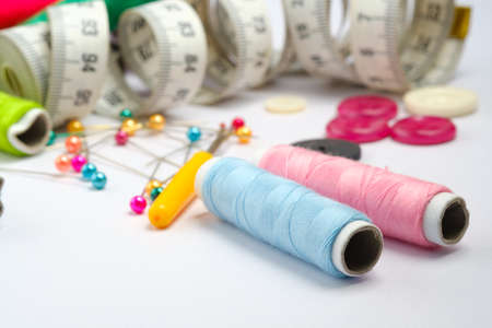 Sewing equipment on white backgroundの写真素材