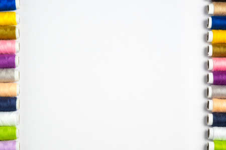 Thread on white background top view with copy spaceの写真素材