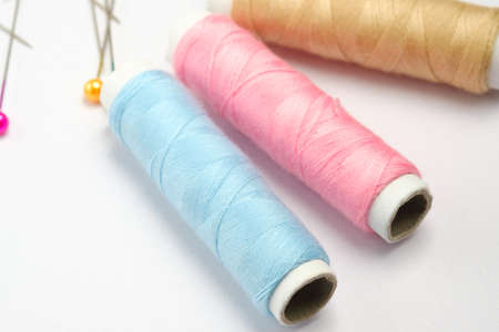 Close up of thread on white background