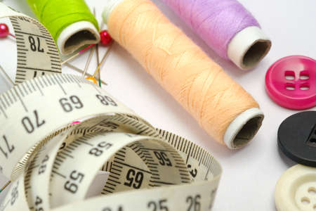 Sewing equipment on white backgroundの写真素材