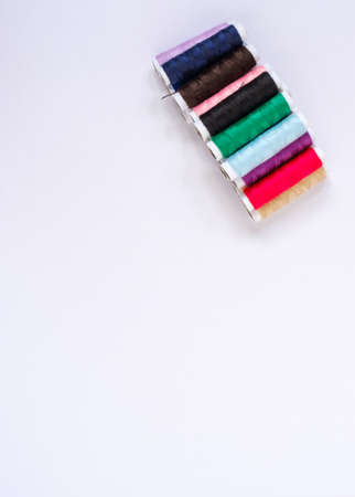 Thread on white background top view with copy spaceの写真素材