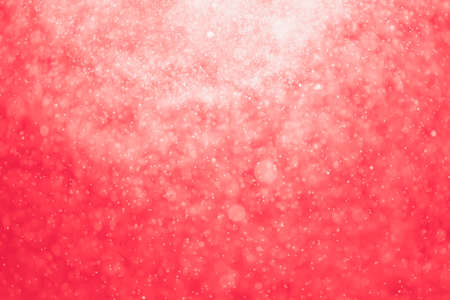 Red glitter bokeh of light.Abstract blurred lightの写真素材
