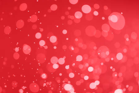 Red glitter bokeh of light.Abstract blurred lightの写真素材