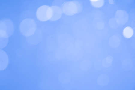 Blue glitter bokeh of light.Abstract blurred lightの写真素材