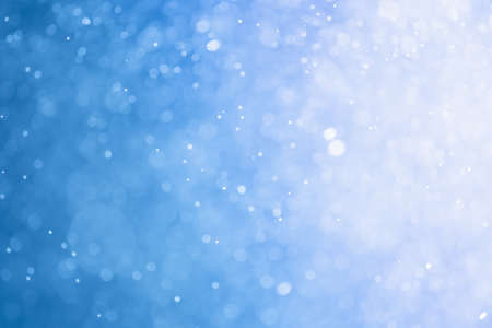 Blue glitter bokeh of light.Abstract blurred lightの写真素材