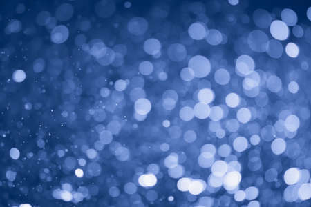 Blue glitter bokeh of light.Abstract blurred lightの写真素材