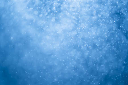 Blue glitter bokeh of light.Abstract blurred lightの写真素材