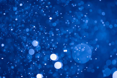 Blue glitter bokeh of light.Abstract blurred light