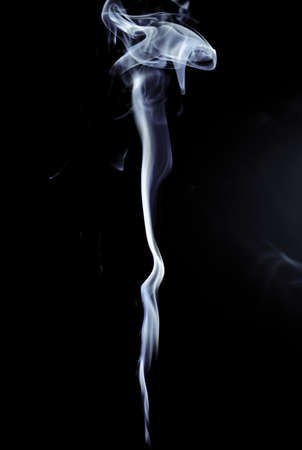 White smoke on black backgroundの写真素材