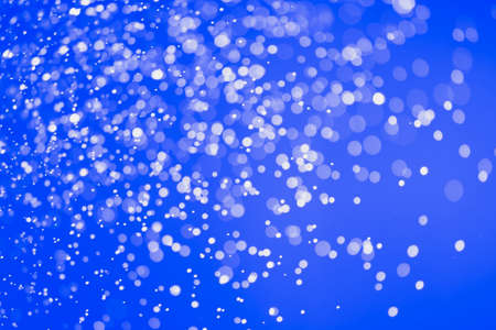 Blue glitter bokeh of light.Abstract blurred light