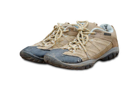 Old shoes isolated on whiteの写真素材