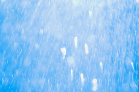 Blue glitter bokeh of light.Abstract blurred lightの写真素材
