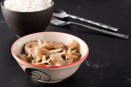 Mushroom soup placed on a black background.Mushroom Soup in Ceramic bowl.food in bowl with copy space.の写真素材