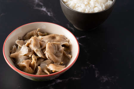 Mushroom soup placed on a black background.Mushroom Soup in Ceramic bowl.food in bowl with copy space.の写真素材