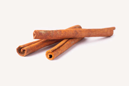 Cinnamon reality on white background.Cinnamon helps relieve fatigue. Give freshness.Cinnamon sticks.Used as a food ingredient.の写真素材