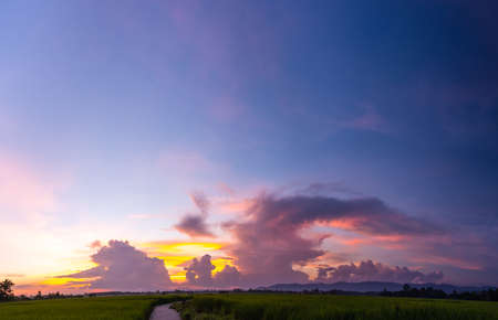 Colorful sunset and sunrise with clouds.Blue and orange color of nature.Many white clouds in the...