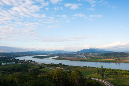 The sky has clouds and the Mekong River.sky and cloud.white clouds.Village near the river.Border river.River border Thailand and Laosの写真素材