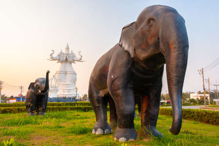 Statue elephant-snake. A white three-headed elephant statue at the intersection before Chiang Saen Hospital. Chiang saen,Chiang Rai,Thailandの写真素材