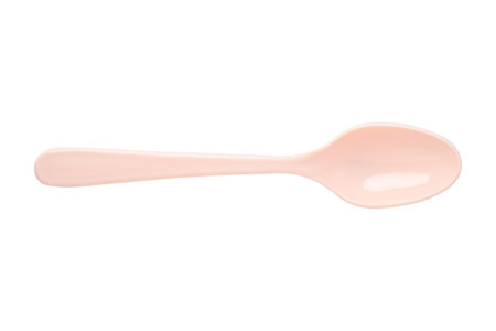 Pink plastic spoon in isolated  .Plastic kitchen utensilsの写真素材