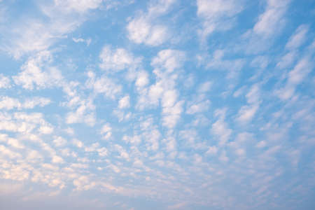White cloudy with a blue  sky.Wave clouds on the sky.Fluffy cloudの写真素材