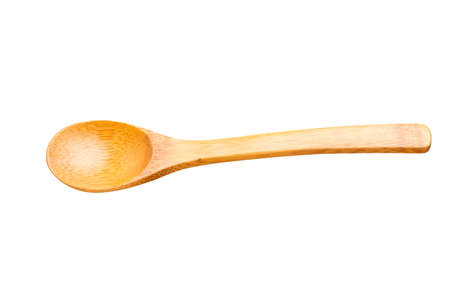 Wooden spoon on white background. The spoon is made of real wood material. Kitchen appliances in isolatedの写真素材