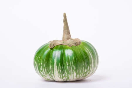 Close up and selective focus green eggplant.Eggplant on white backdropの写真素材