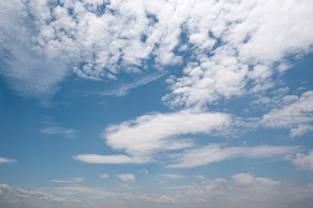 Many small clouds in blue sky.Summer cloudy.White clouds floating in the skyの写真素材