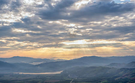 Landscape with clouds,sky and  mountains of northern Thailand. Mountains in Asia in the morning sun through the cloudsの写真素材